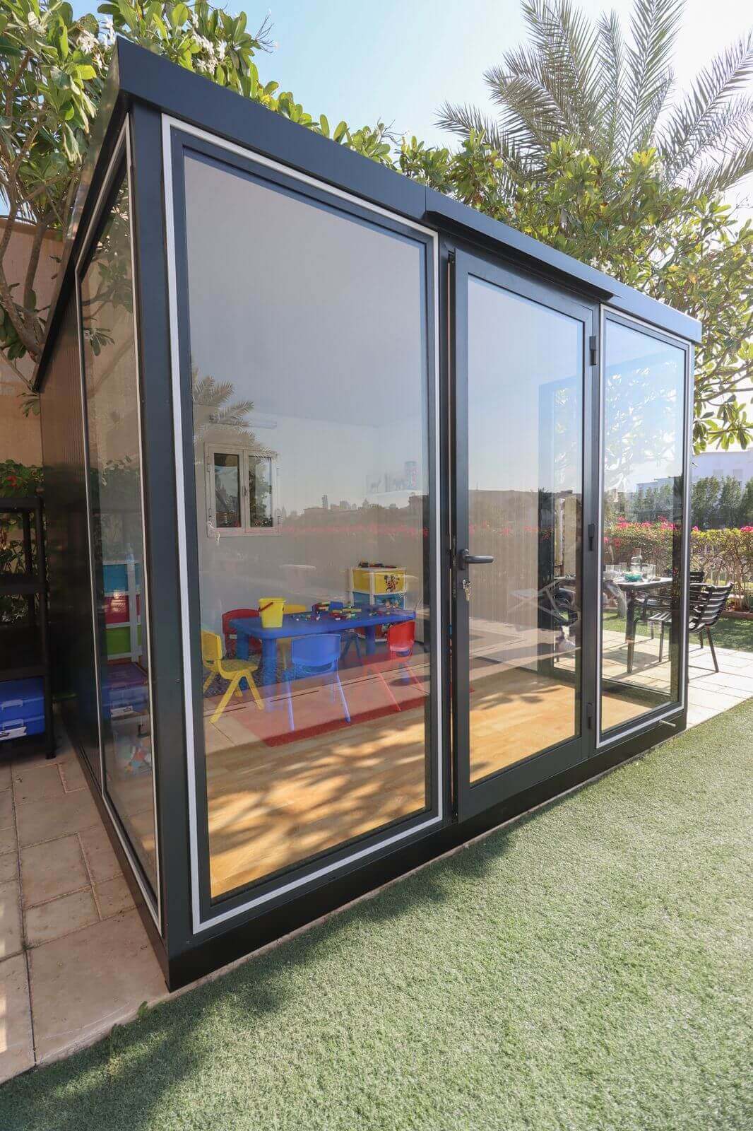 Duramax 10' x 10' Garden Glass Room 32001 Close up view front childrens playroom