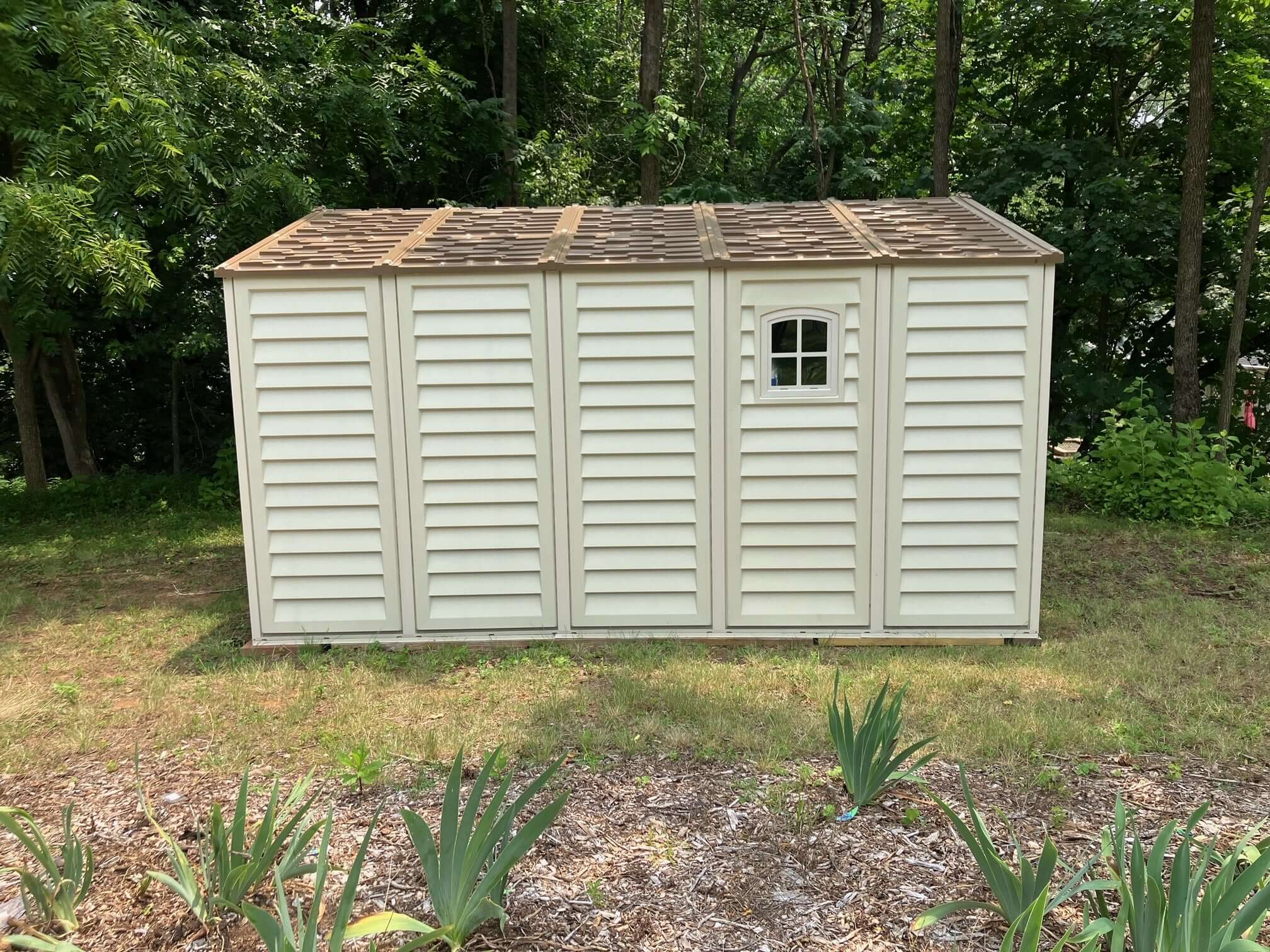 Duramax 10.5ft X13ft Woodbridge Vinyl Plus with Foundation 40234 CA rear view in yard window