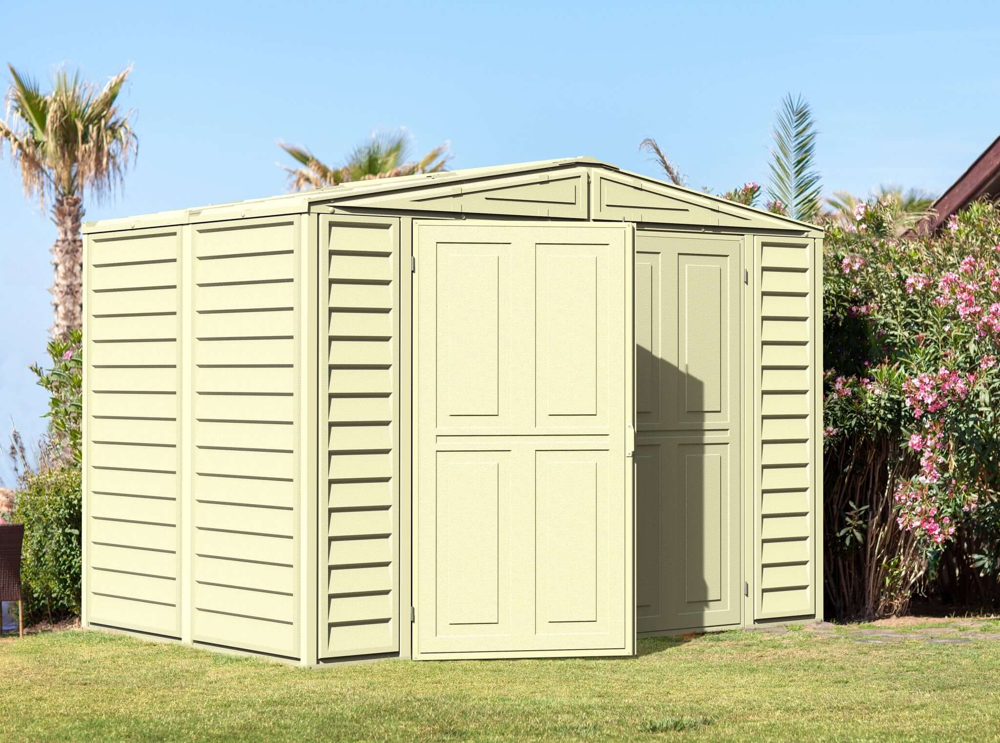 Duramax 8' x 5.3' DuraMate Shed with Foundation Kit 00184 lifestyle view in yard door ajar